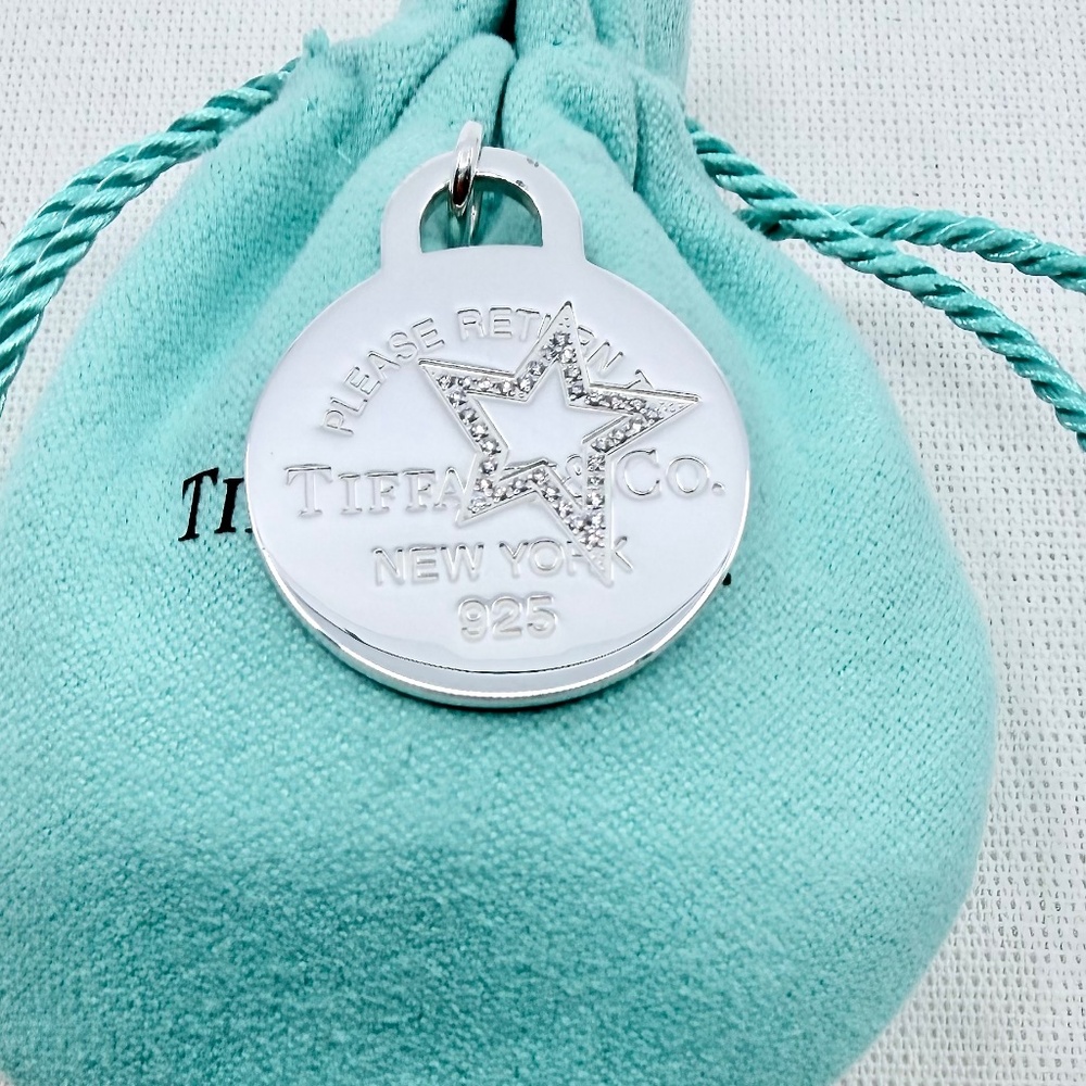 RETIRED Tiffany & Co LARGE Round Star Diamond Charm Pendant in Silver